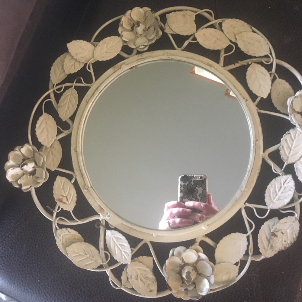 Decorative floral mirror.